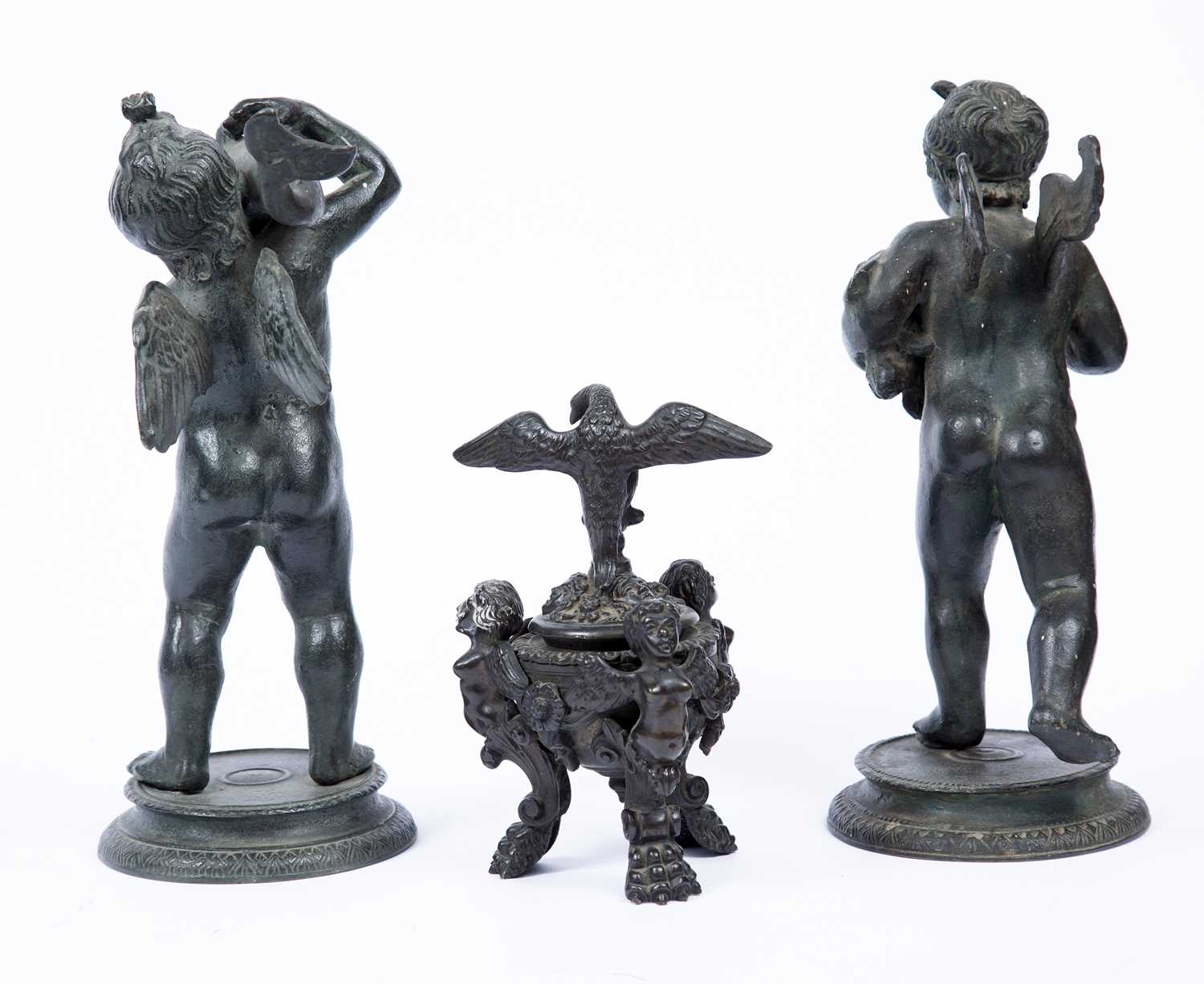After Fernando de Luca, a bronze figure of a winged cherub holding a dolphin and companion figure of - Image 2 of 2