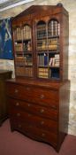 A George III mahogany secretaire chest, the secretaire drawer enclosing open shelving and above