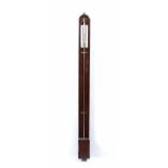 An early 19th century mahogany stick barometer, of plain form with arched top, having ivory inset
