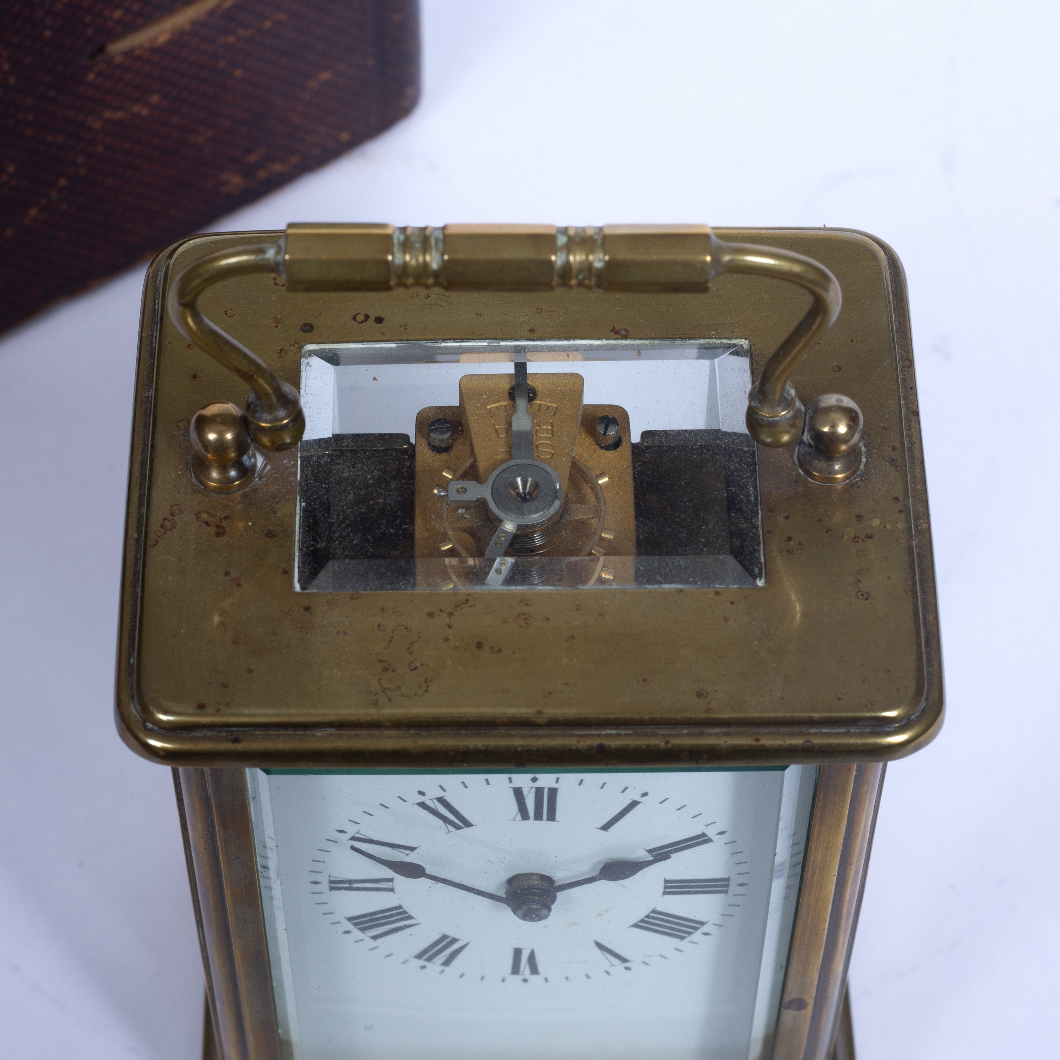 A 19th century French brass carriage timepiece, with white enamel dial, on bracket feet, 11.5cm - Image 2 of 3