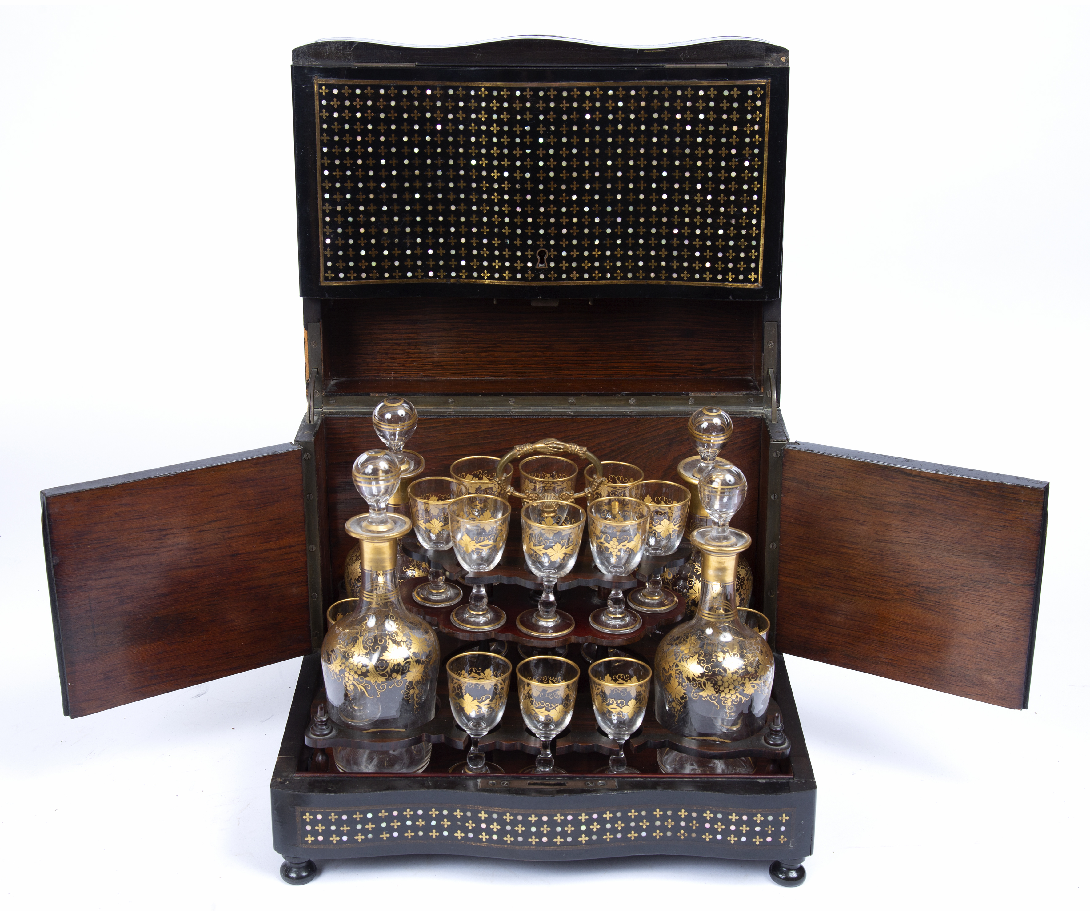 A late 19th century French gilded glass liqueur set, sixteen small baluster glasses and four