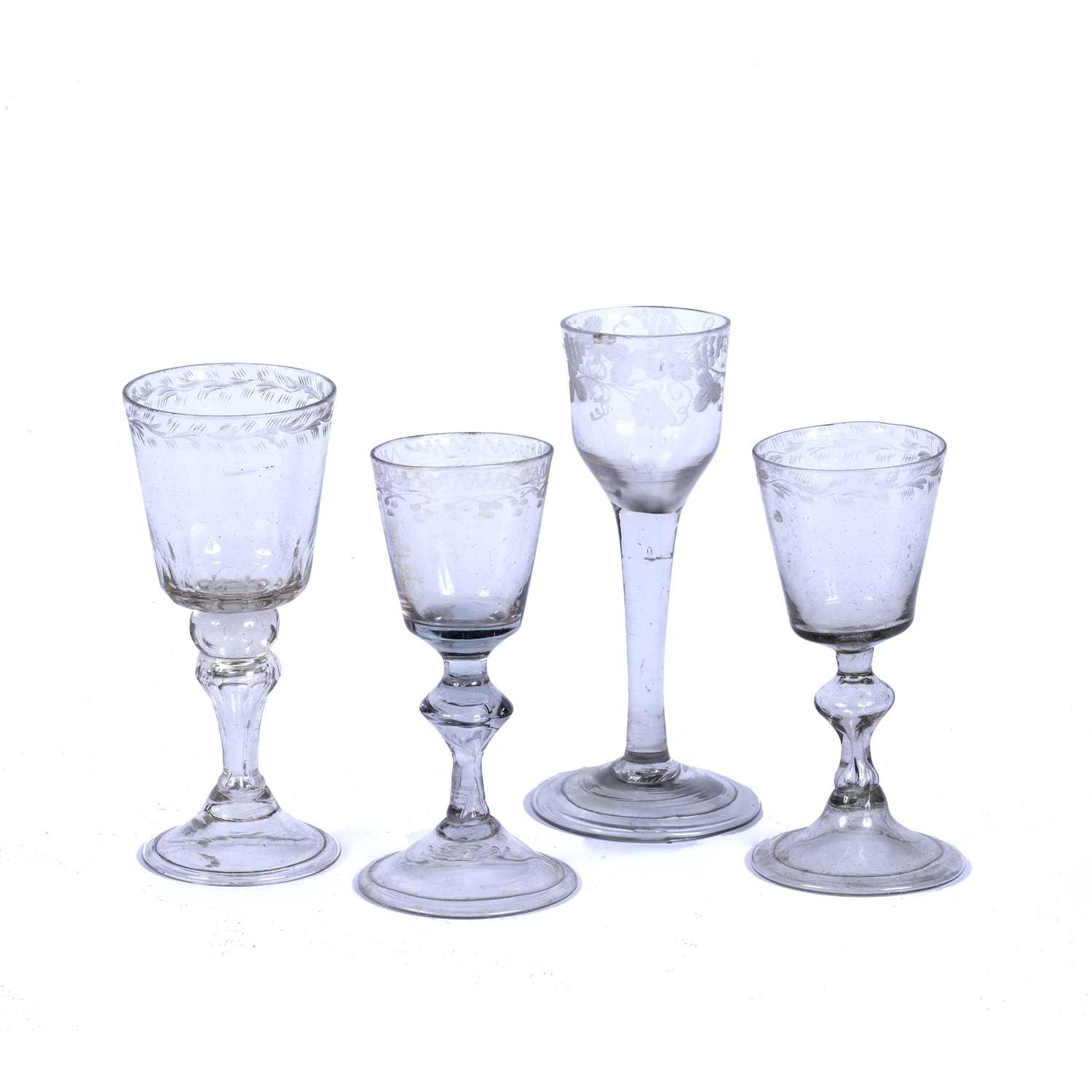 An 18th century wine or cordial glass, the bowl etched with fruiting vine, on plain tapering stem