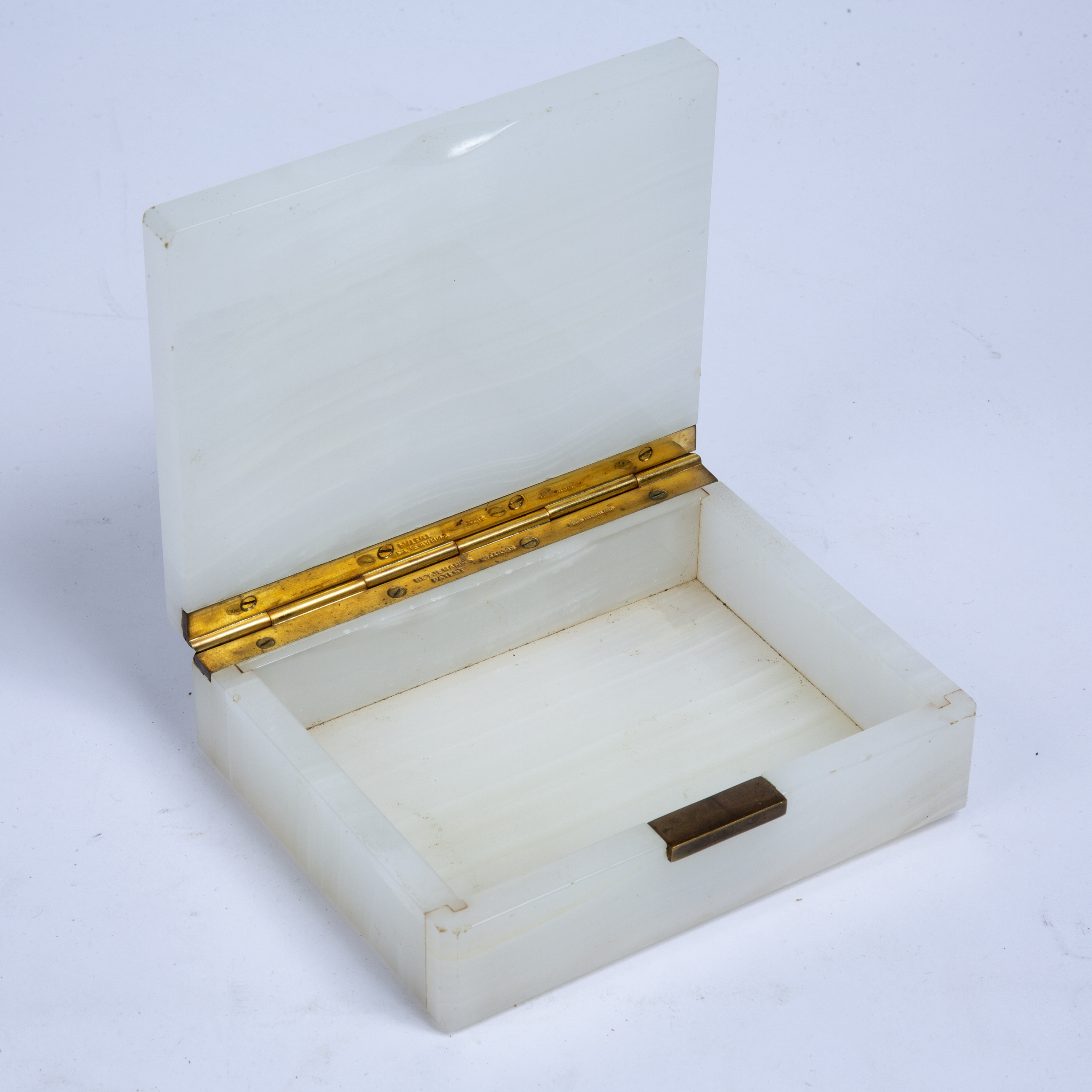 An Art Deco white onyx rectangular box, the sprung gilt metal hinge stamped 'Betjemann's Patent, No. - Image 6 of 6