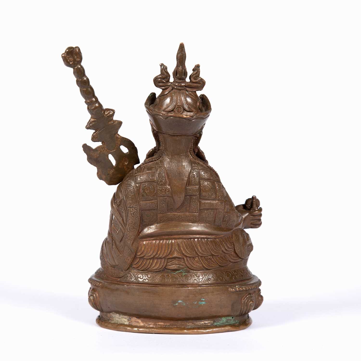 A 19th Century Tibetan seated Buddha, cast copper with engraved decoration, the Buddha holding a - Image 2 of 3