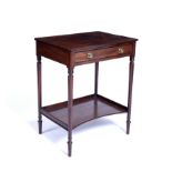 A Regency mahogany side table with one long drawer with brass knobs and concave undertier, on ring