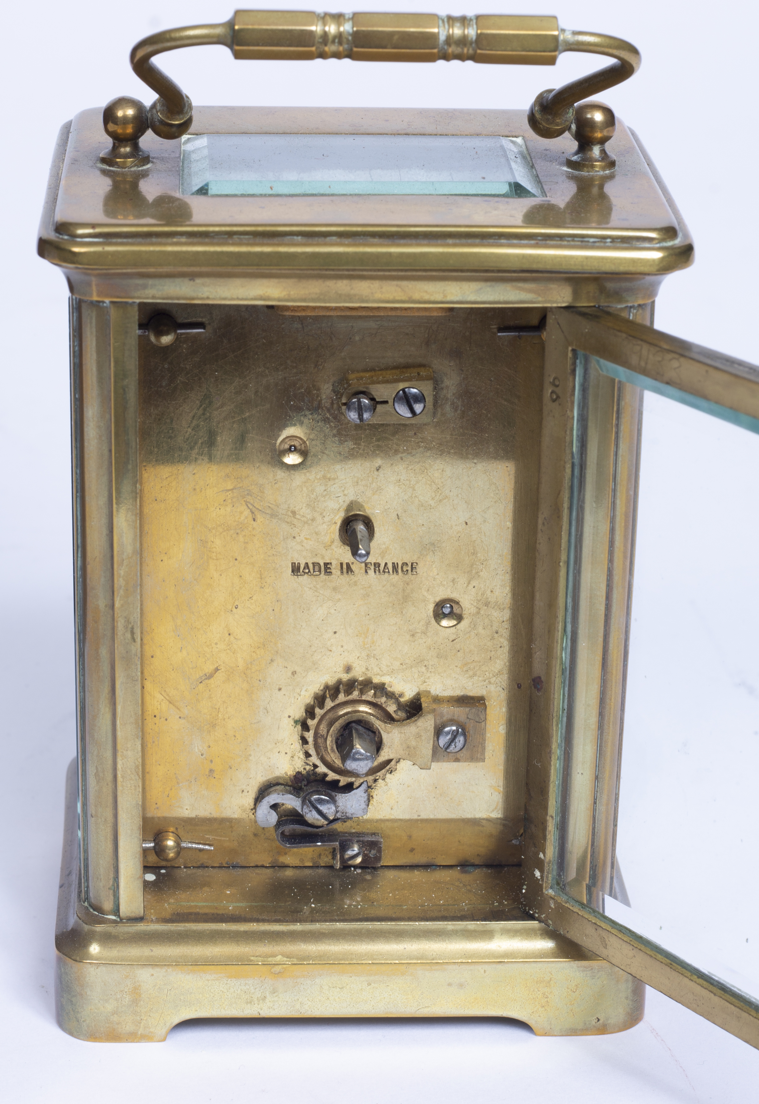 A 19th century French brass carriage timepiece, with white enamel dial, on bracket feet, 11.5cm - Image 3 of 3