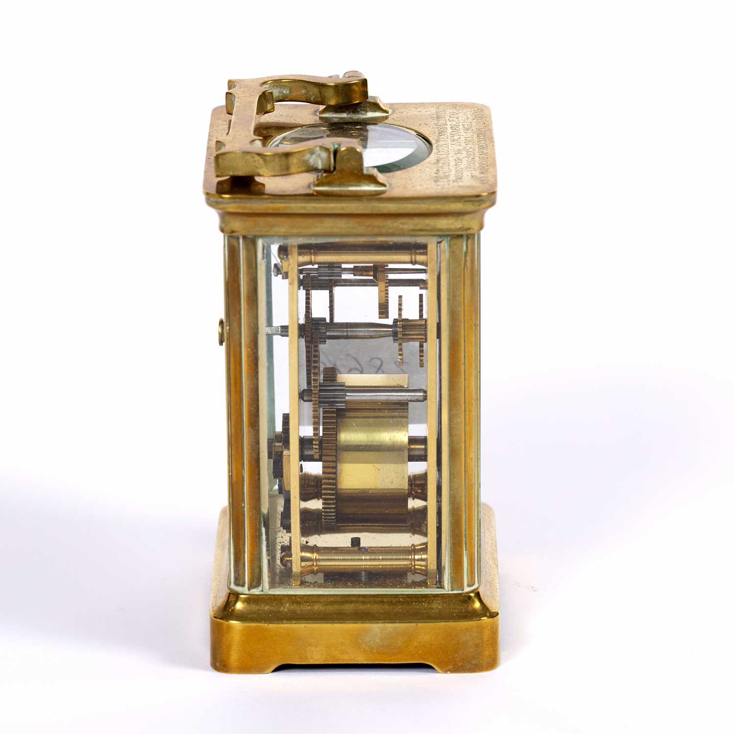 An early 20th century French brass carriage timepiece with white enamel dial, the plain case with - Image 3 of 5
