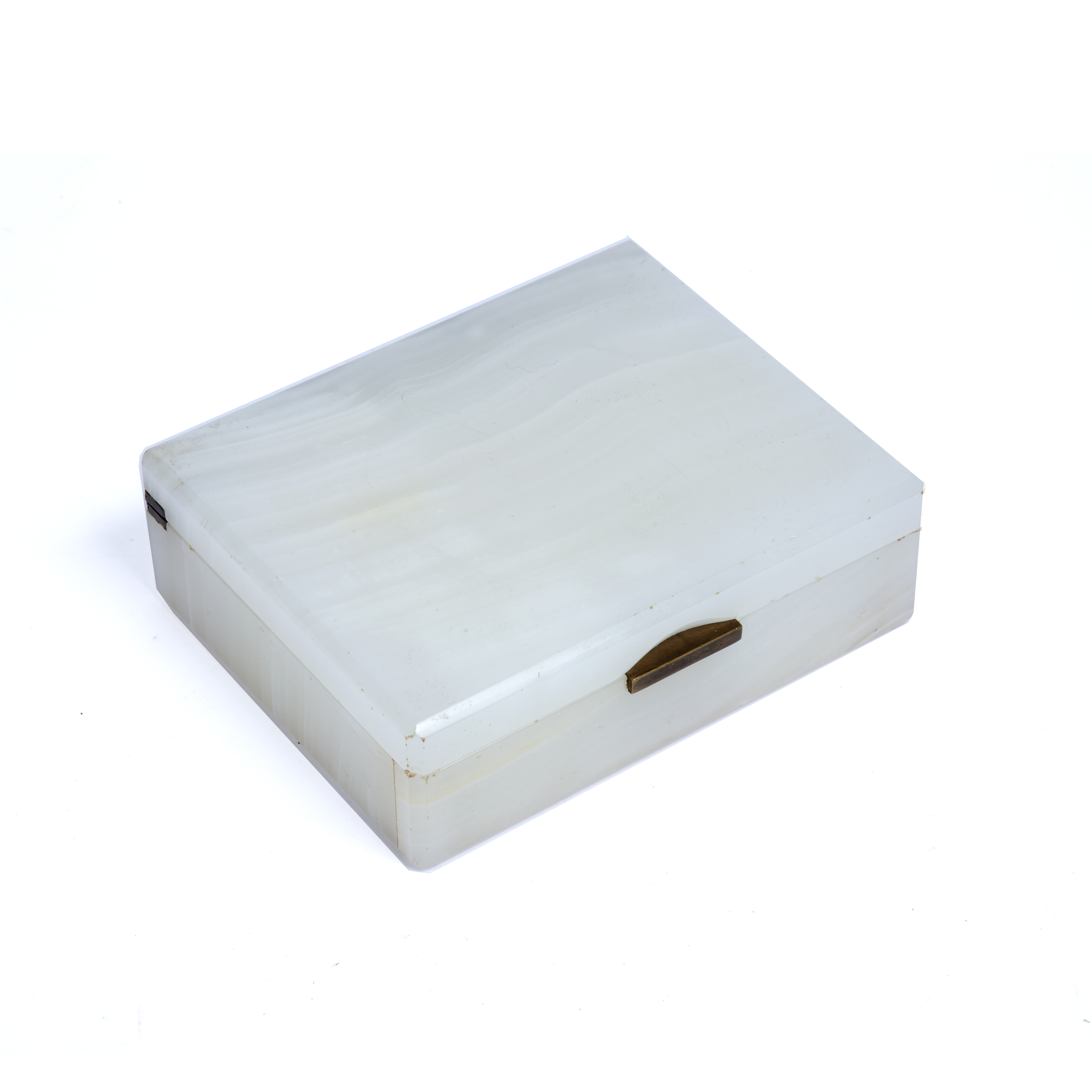 An Art Deco white onyx rectangular box, the sprung gilt metal hinge stamped 'Betjemann's Patent, No.