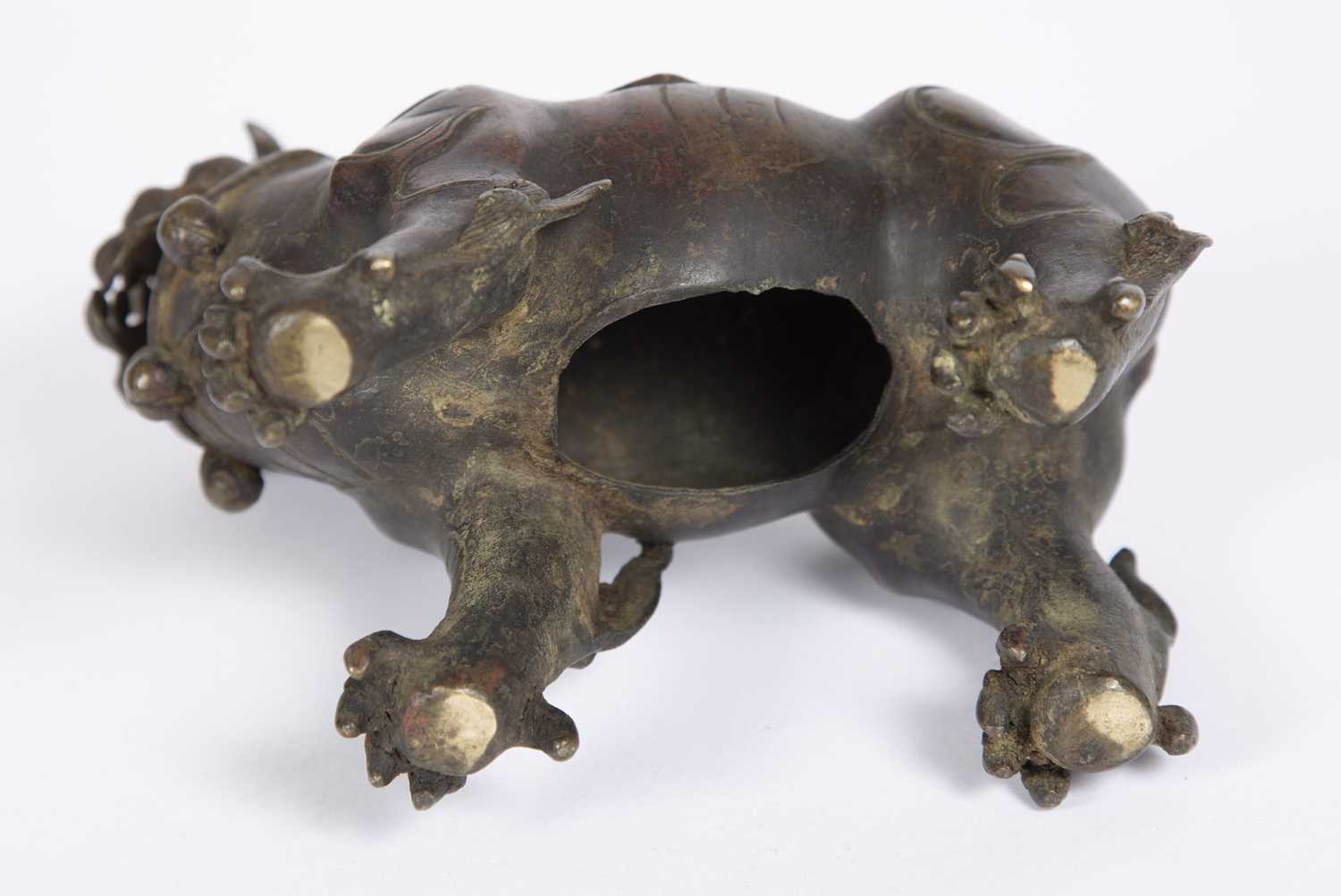 A Chinese early bronze censer in the form of a mythical beast, the head turning backwards with - Image 3 of 3