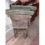 A set of four early 20th century teak and elm iron folding garden chairs each 46cm wideCondition