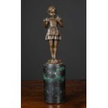 An Art Deco style bronze statuette of a girl after Ferdinand Preiss, inscribed 'Preiss' to the base,