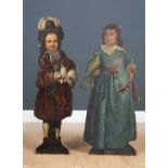 A pair of 17th century dummy boards, the boy in a red ruffled coat holding a dog and the girl in a