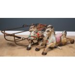 Two Mobo mid-20th century painted tin horses, the larger merry-go-round style, with pink and gold