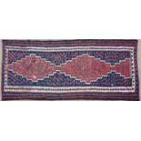 A Kurdish red and blue ground kelim 271cm x 129cmCondition report: in good condition with some minor