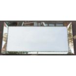 A large Venetian wall mirror with applied mirrored slips to the frame, 100cm wide x 200cm