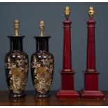 Two pairs of table lamps; one pair with red painted square stepped wooden bases, 49.5cm high, the
