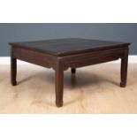 A Chinese low hardwood centre table with carved apron, 99cm wide x 90cm deep x 46cm highCondition