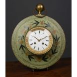 A French 19th century green painted toleware wall clock the circular case with ring suspension and