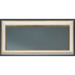 A modern gilt and white painted wall mirror, 44cm wide 92cm high.Condition report: Chipped to the