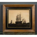A 19th century reverse glass silhouette painting depicting a three masted galleon, possibly The