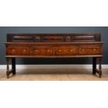 A late 18th / early 19th century North Country oak dresser with four drawers, each with acorn drop