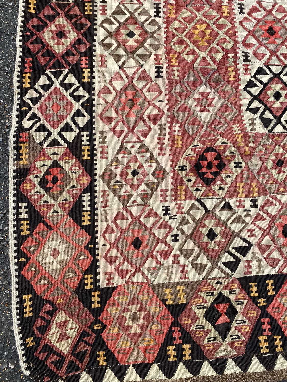 An early 20th century Kelim rug in green, red and orange, 152cm x 390cmCondition report: In moderate - Image 2 of 4