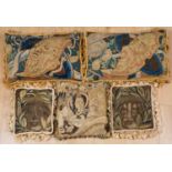 A pair of 17th century tapestry fragments used as cushions, each decorated with bearded masks and