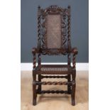 A 17th century Carolean child's chair with pierced crown and scroll ornament to the cresting rail,