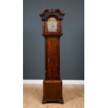 A George III unusual sized oak eight day longcase clock, the hood with swan neck pediment, blue