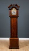 A George III unusual sized oak eight day longcase clock, the hood with swan neck pediment, blue