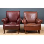 A near pair of leather roll top armchairs, one with red-brown upholstery on wooden castor feet,