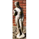 A composite stone statue of a semi clad female, 81cm high together with a composite stone statue