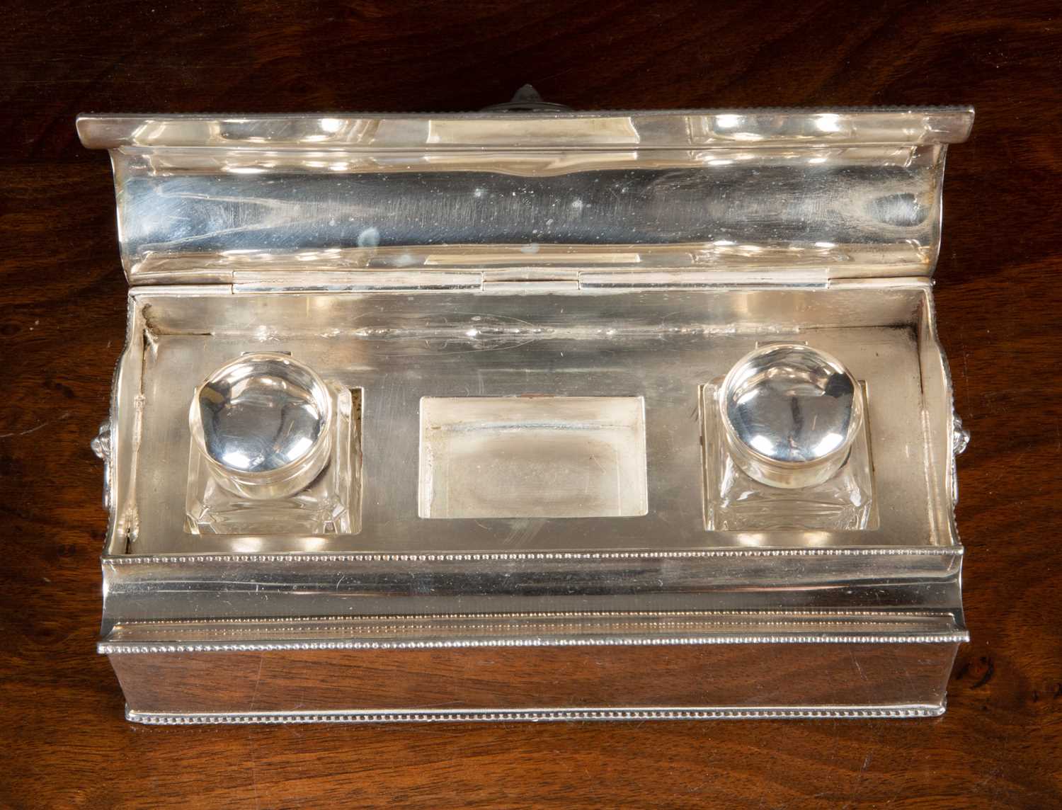 A 19th century silver plated casket form desk stand, containing two cut glass and silver plated - Image 3 of 4