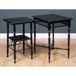 A Victorian ebonised aesthetic two tier occasional table with ring turned legs, the undertier