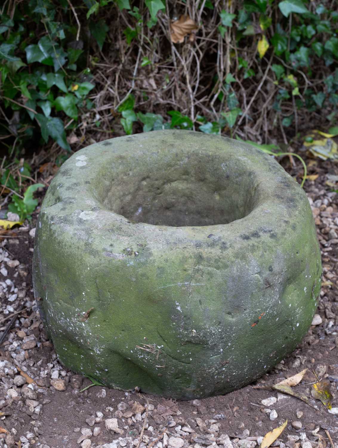 An ancient limestone "Knocker" or Scottish ponding mortar, Iron age or Celtic period, found in the