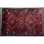 A Middle Eastern red ground rug 248cm x 171cmCondition report: In good condition with some minor