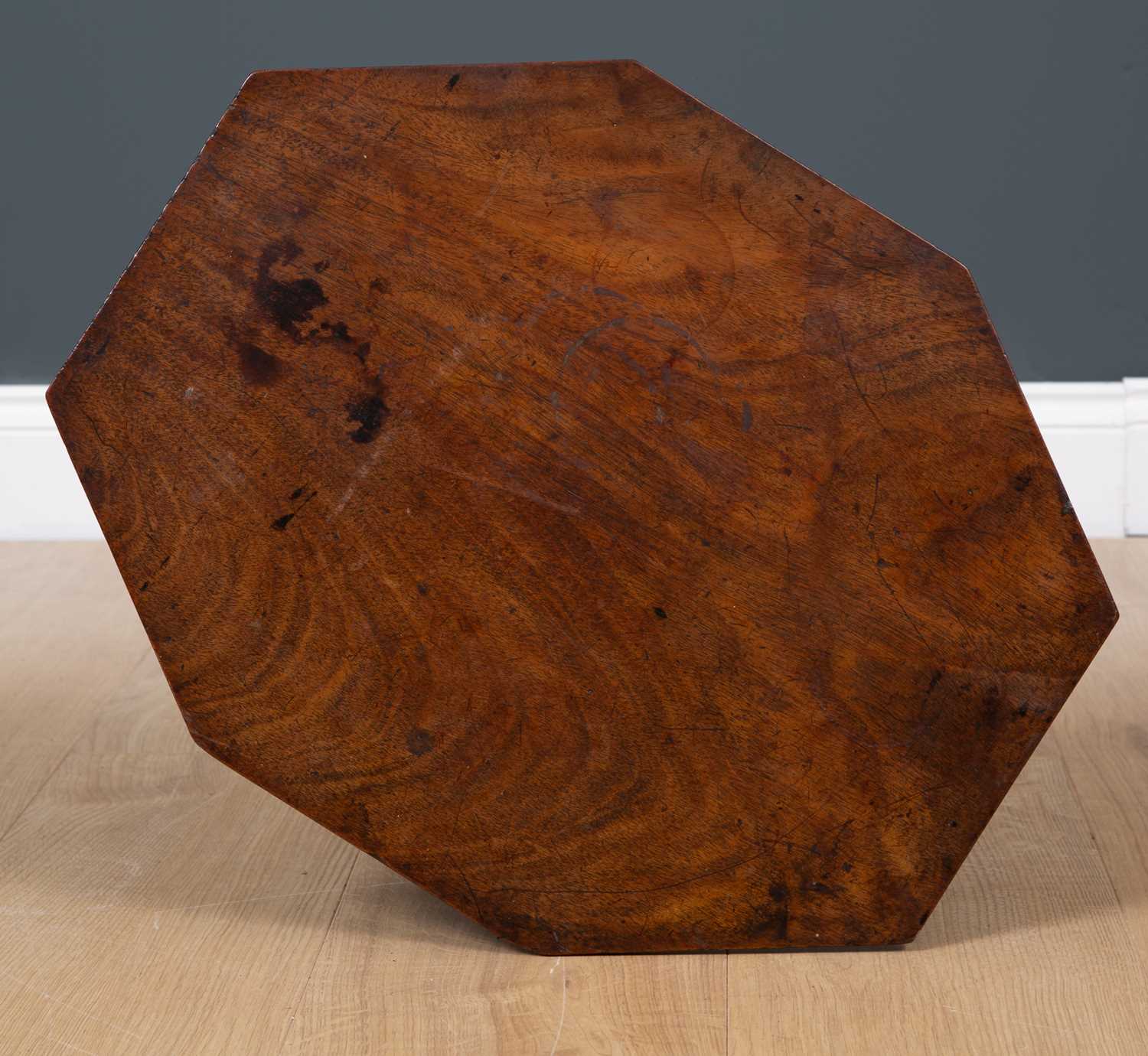 A mahogany occasional table with octagonal top, turned column support, triform base and bun feet, - Image 2 of 2