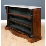 A 19th century marble topped open fronted bookcase, the three shelves with gilt leather tooled