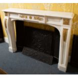 An early 20th-century statuary marble chimney piece, with ormolu mounts to the uprights and