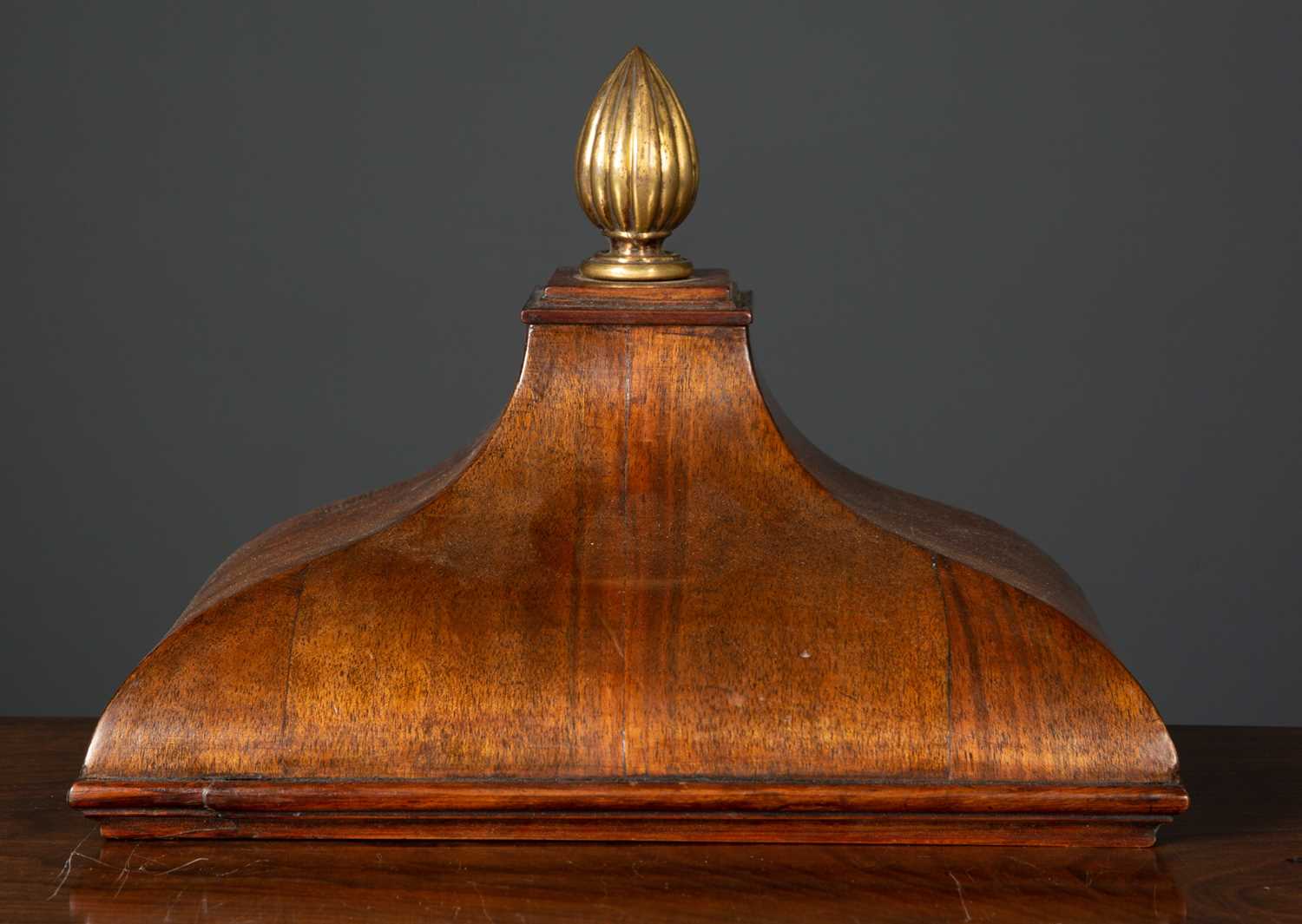 A 19th century walnut clock wall bracket with ogee form with brass finial, 28.5cm wide x 17.5cm deep - Image 2 of 3