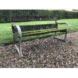 An old garden bench with painted cast iron ends and hardwood slats, 151cm wide x 66cm deep x 79cm