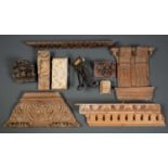 Architectural elements, a group of nine Georgian carved wooden and cast iron pieces of architrave,