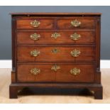 A George III mahogany small chest of two short and three long drawers with fluted quarter pilaster