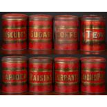A set of eight 19th century storage tins, red enamelled with bold gold label within scrolling