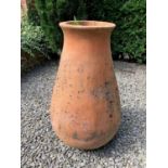 A terracotta garden planter of baluster form, 50cm diameter x 95cm highCondition report: In