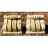 A pair of cast reconstituted stone scrolling corbels each 30cm wide x 15cm deep x 25cm highCondition
