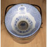 A 19th century porcelain transfer printed chamber pot mounted in a copper bucket by R.Wiss, 38