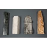 Architectural elements, four pieces of carved marble in various colours, the largest 43cm high (4)