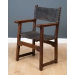 A 19th century Spanish walnut and leather side chair with decorative flower headed studs and