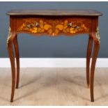 An early 20th century floral and foliate inlaid mahogany writing desk with ormolu mounts and